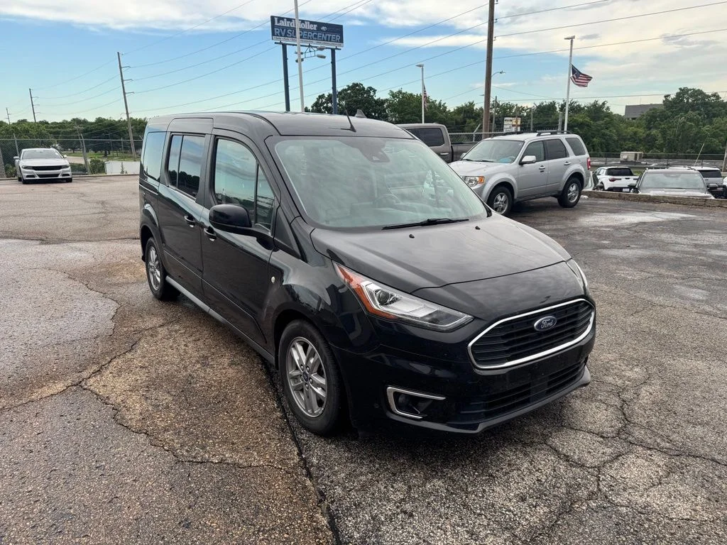 Used 2023 Black Metallic Ford Titanium image 1