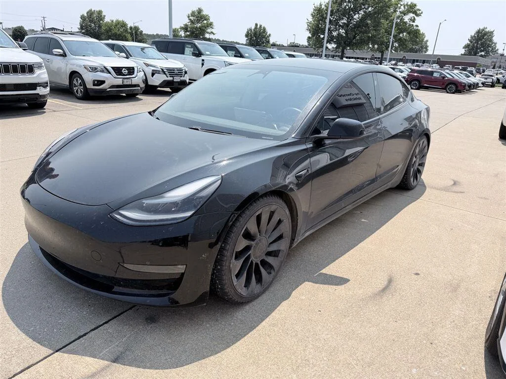 Used 2021 Solid Black Tesla Performance image 3