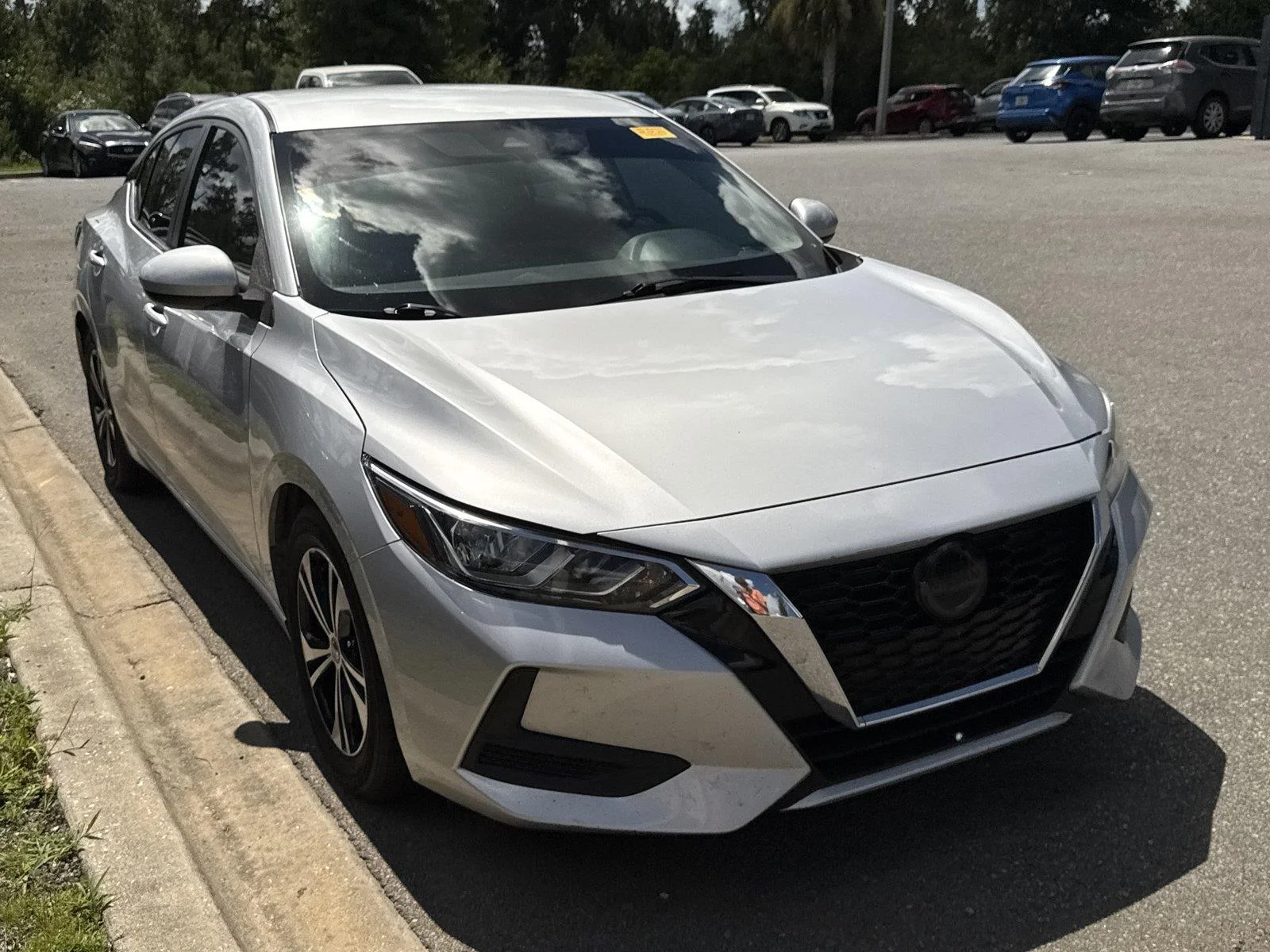 Used 2022 Brilliant Silver Metallic Nissan SV image 1
