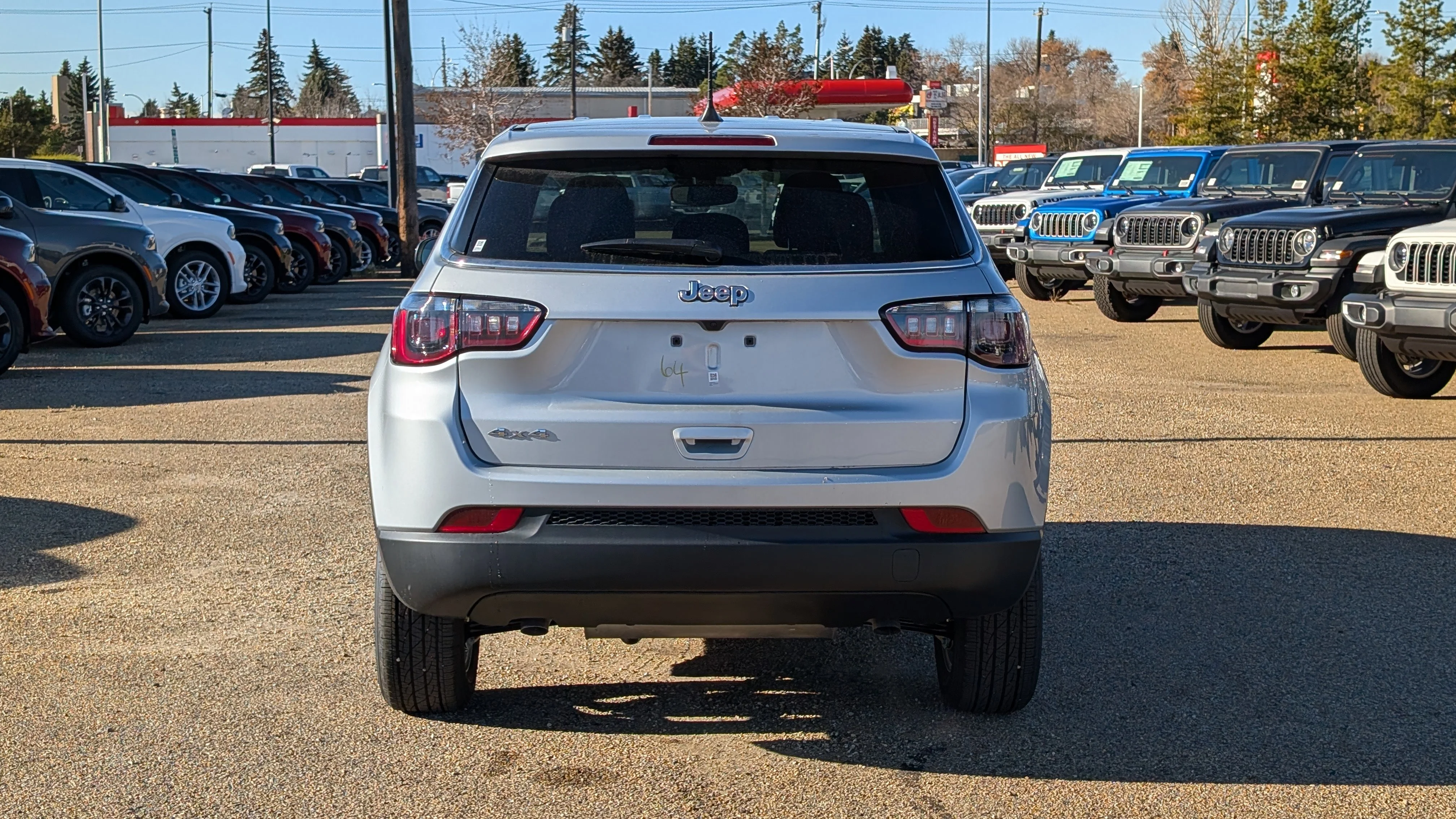 New 2026 Silver Zynith Metallic Jeep Sport image 5