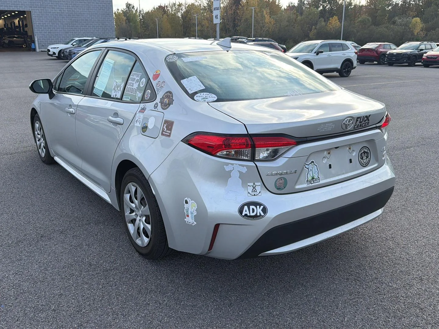 Used 2021 Classic Silver Metallic Toyota LE image 5