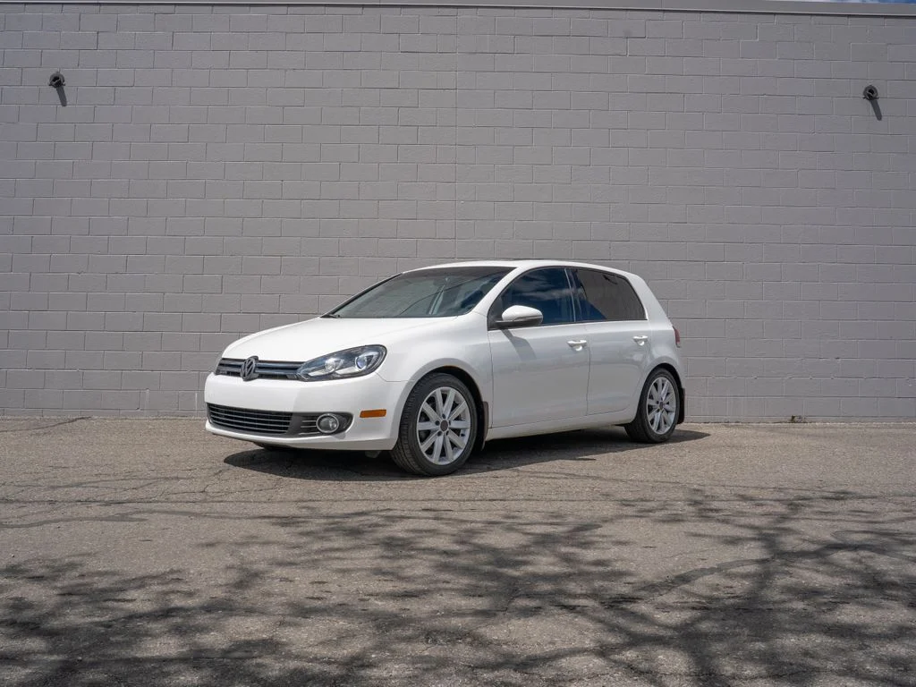 Used 2011 White Volkswagen TDI image 1