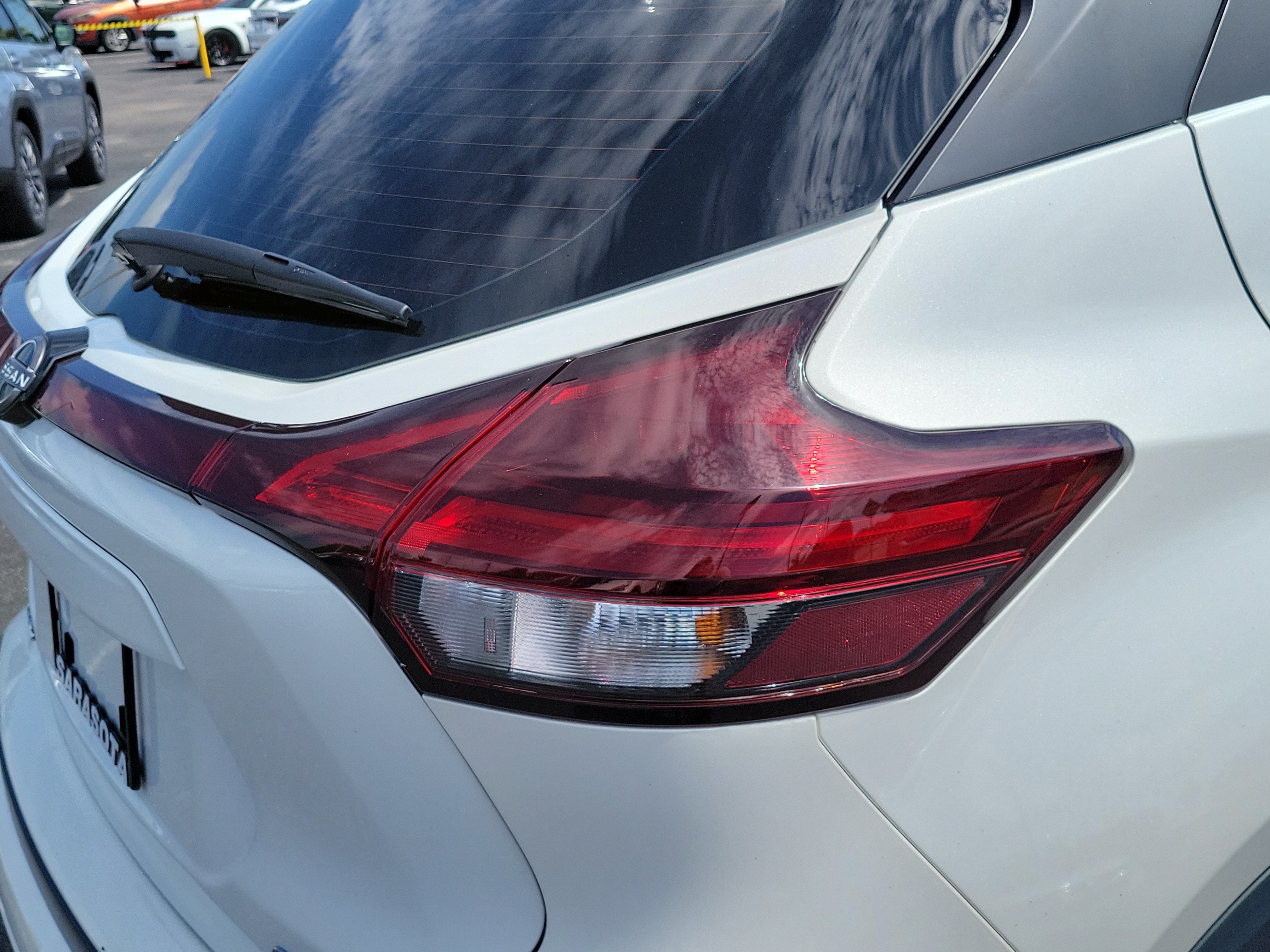 Used 2024 Aspen White Tricoat/Super Black Nissan SV image 10