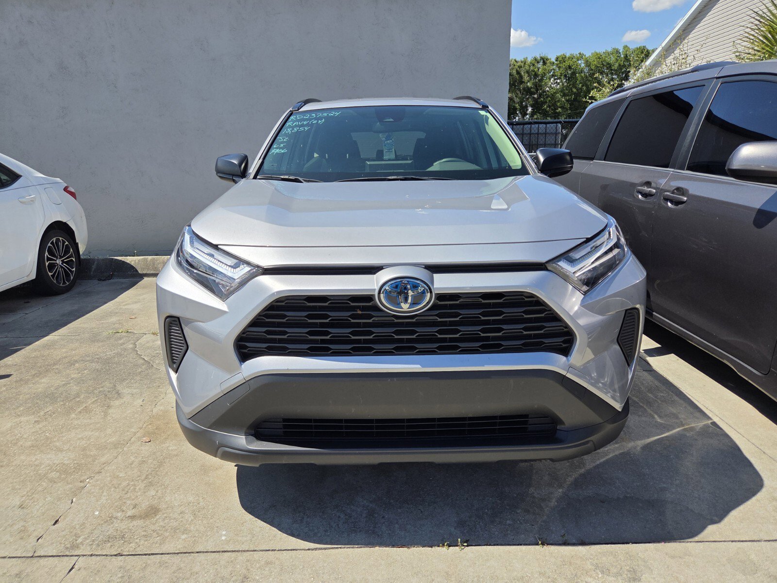 Used 2024 Silver Sky Metallic Toyota LE image 1
