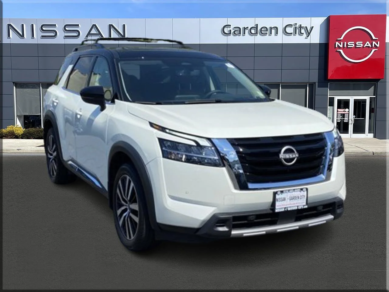 Certified Used 2024 Pearl White Tricoat/Super Black Nissan Platinum image 1