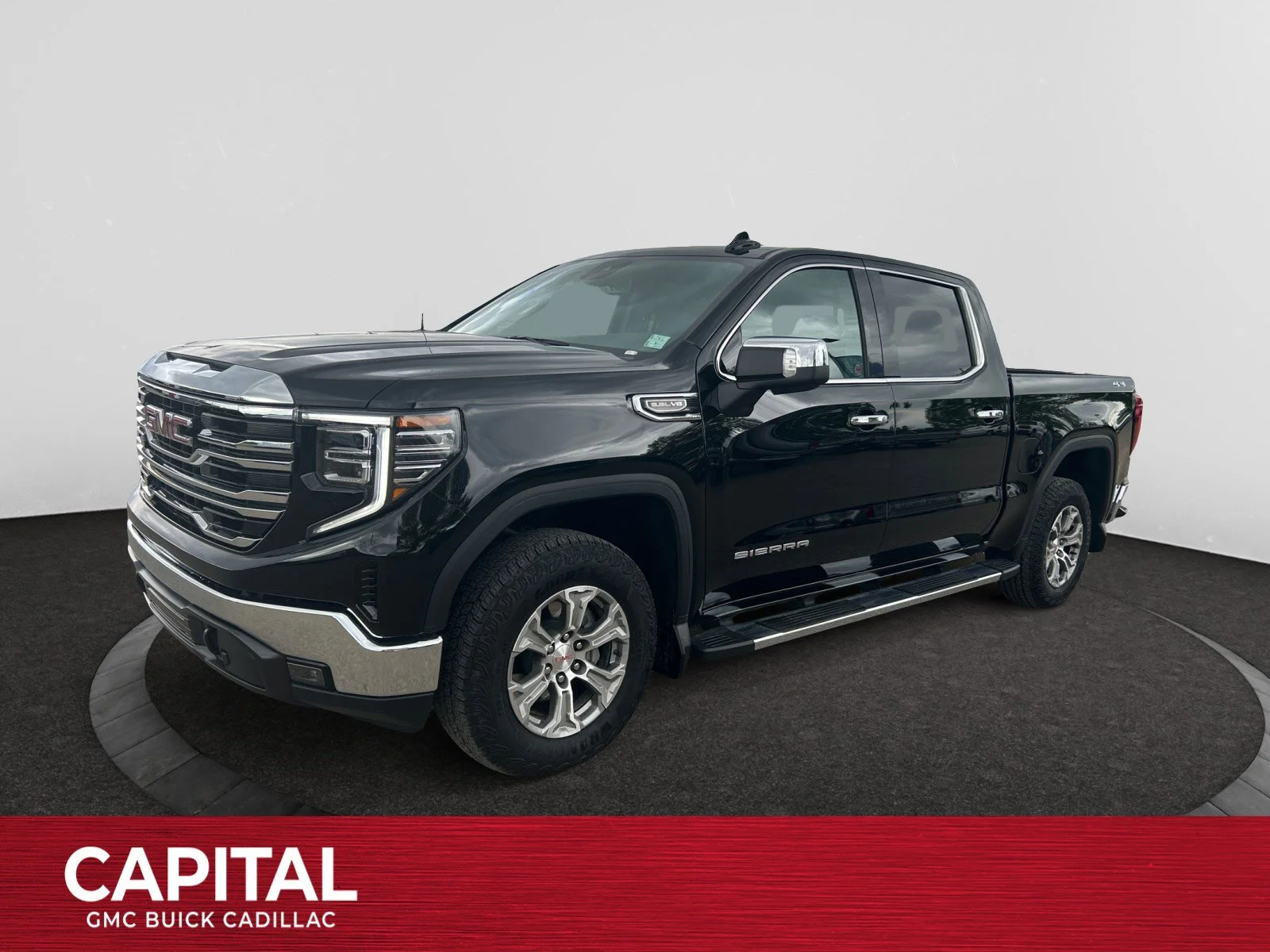 Used 2025 Black GMC SLT Crew Cab image 1
