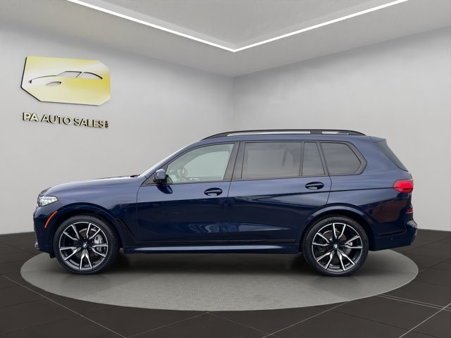 Used 2022 Tanzanite Blue II Metallic BMW xDrive40i image 4