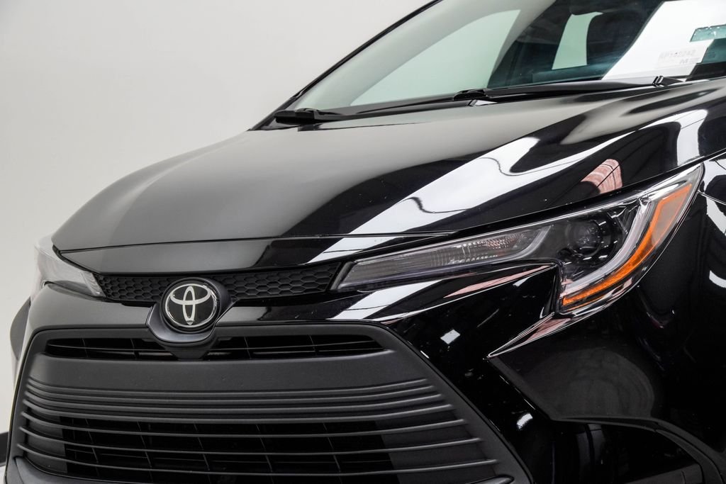 Used 2024 Black Toyota LE image 2