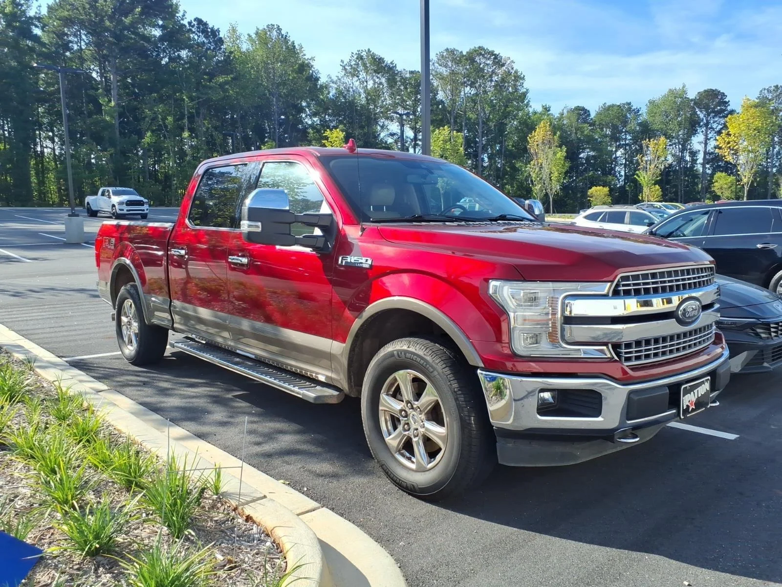 Used 2018 Ruby Red Metallic Tinted Clearcoat/Stone Gray Ford LARIAT image 3