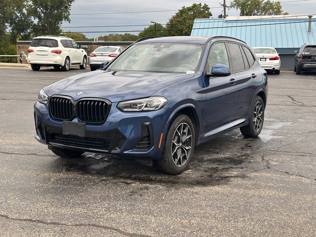 Used 2024 Blue Metallic BMW xDrive30i image 1