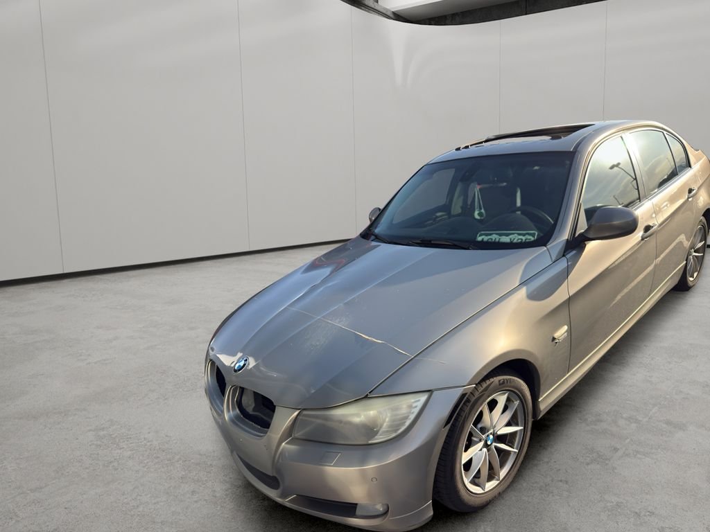Used 2010 Titanium Silver Metallic BMW 328i xDrive image 1