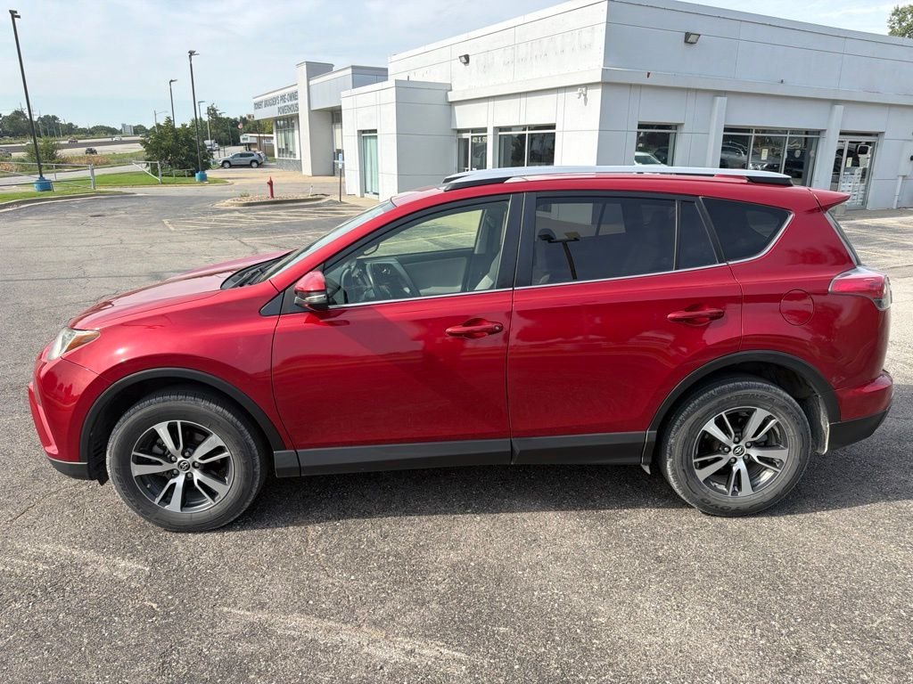 Used 2016 Red Toyota XLE image 1