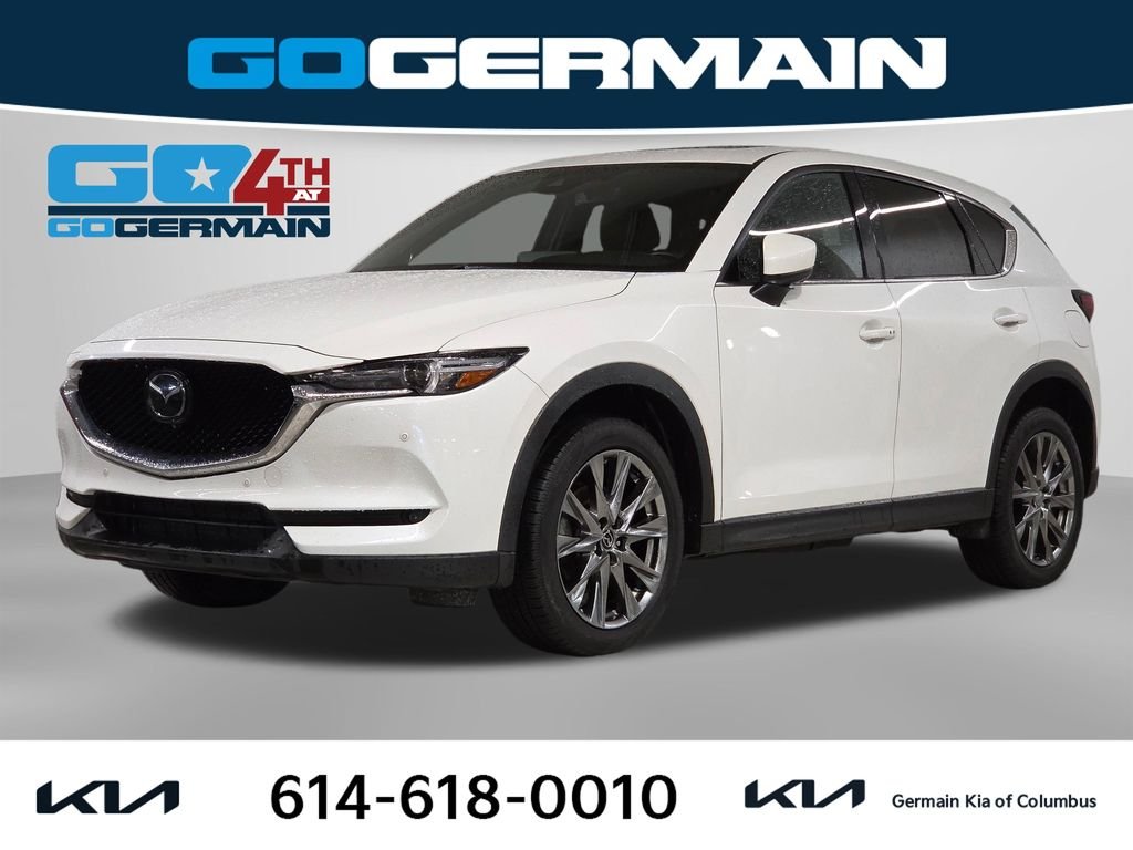 Used 2021 White Mazda Signature image 1