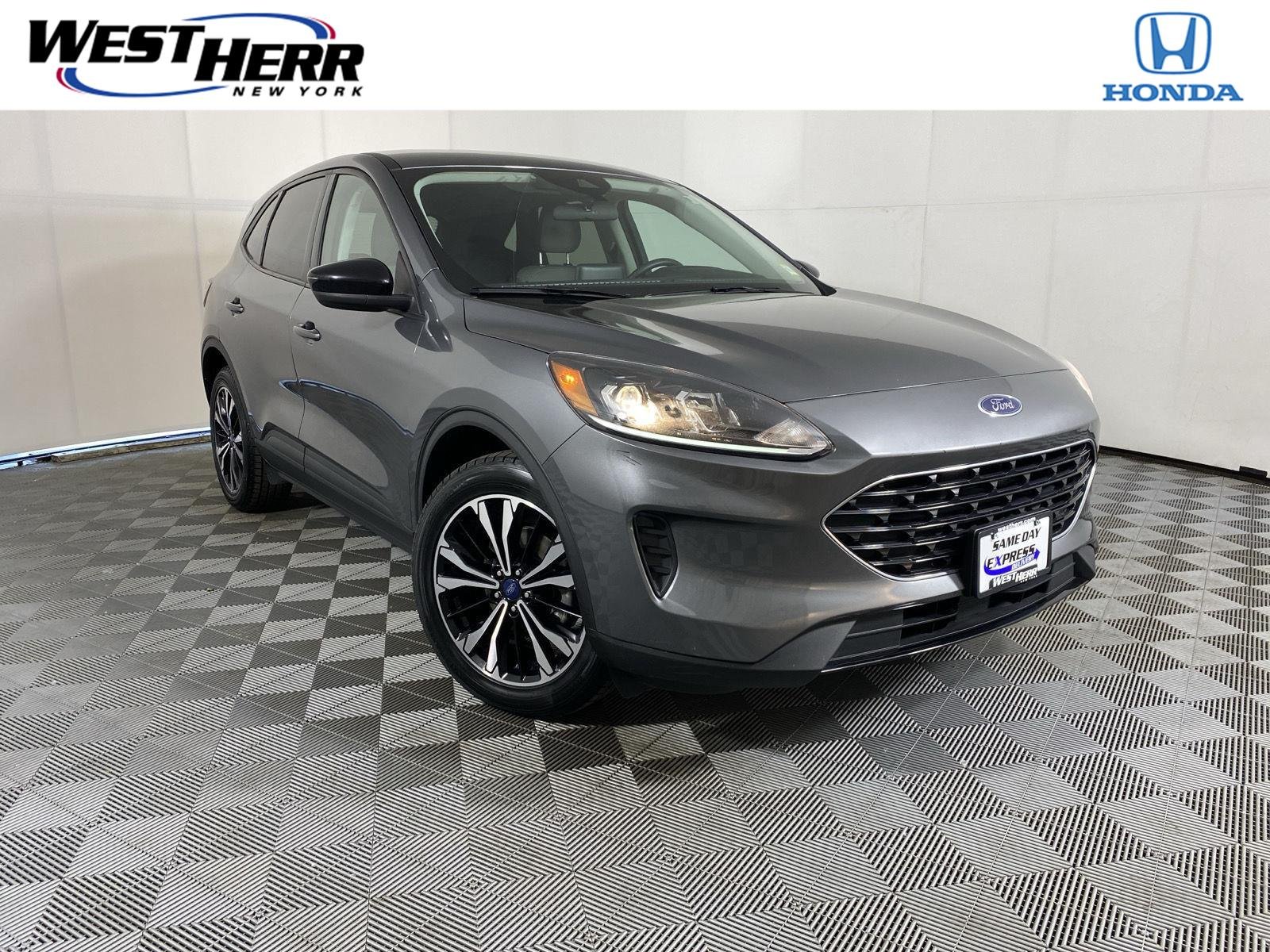 Used 2022 Carbonized Gray Ford SE Hybrid image 1