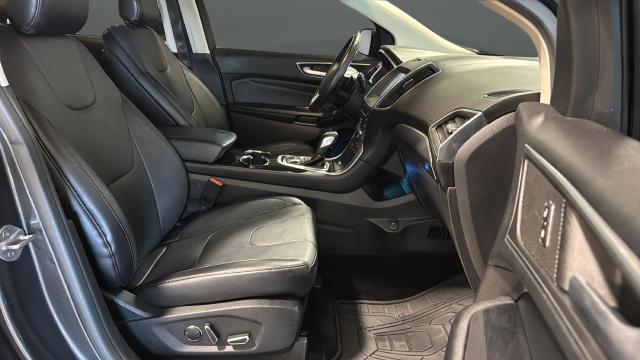 Used 2015 Magnetic Metallic Ford Titanium image 25