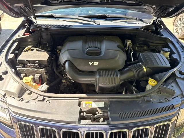 Used 2014 True Blue Pearlcoat Jeep Limited image 22