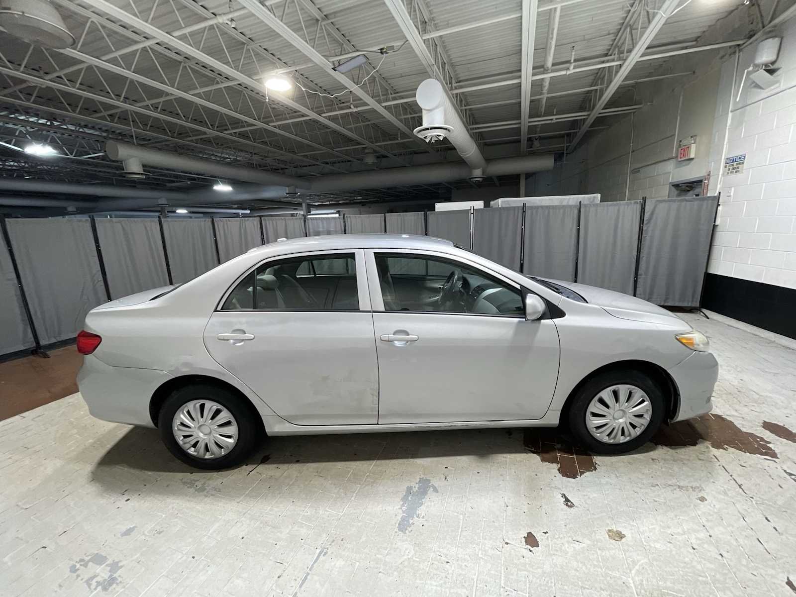 Used 2010 Classic Silver Metallic Toyota LE image 26