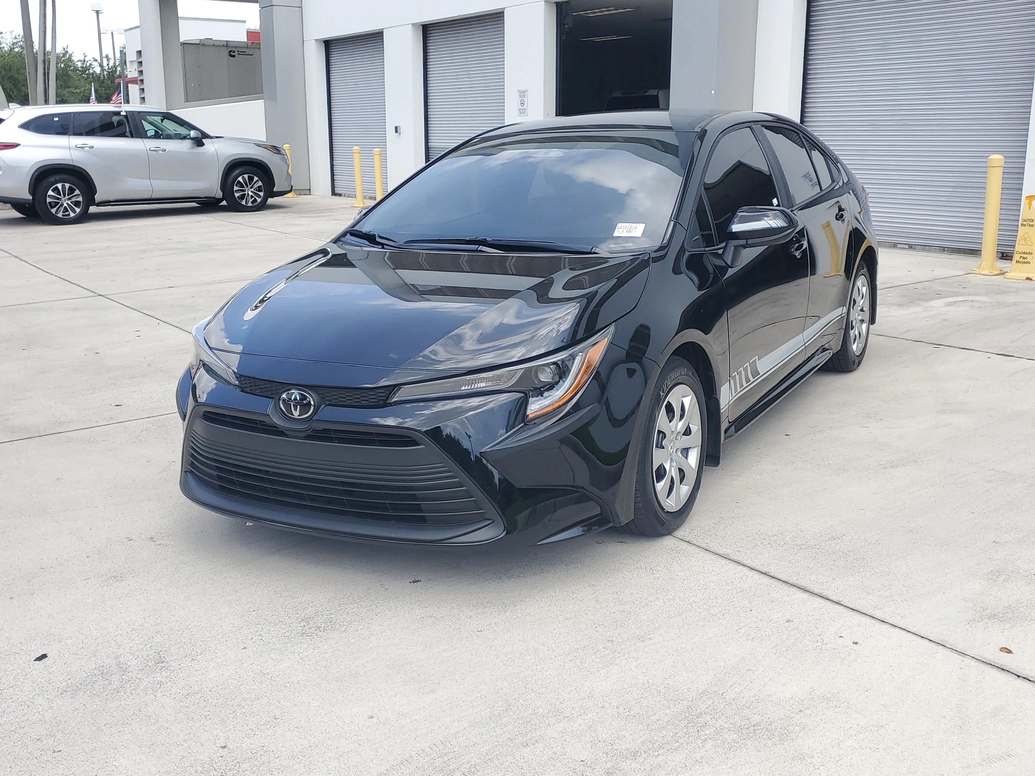 Used 2025 Midnight Black Metallic Toyota LE image 7