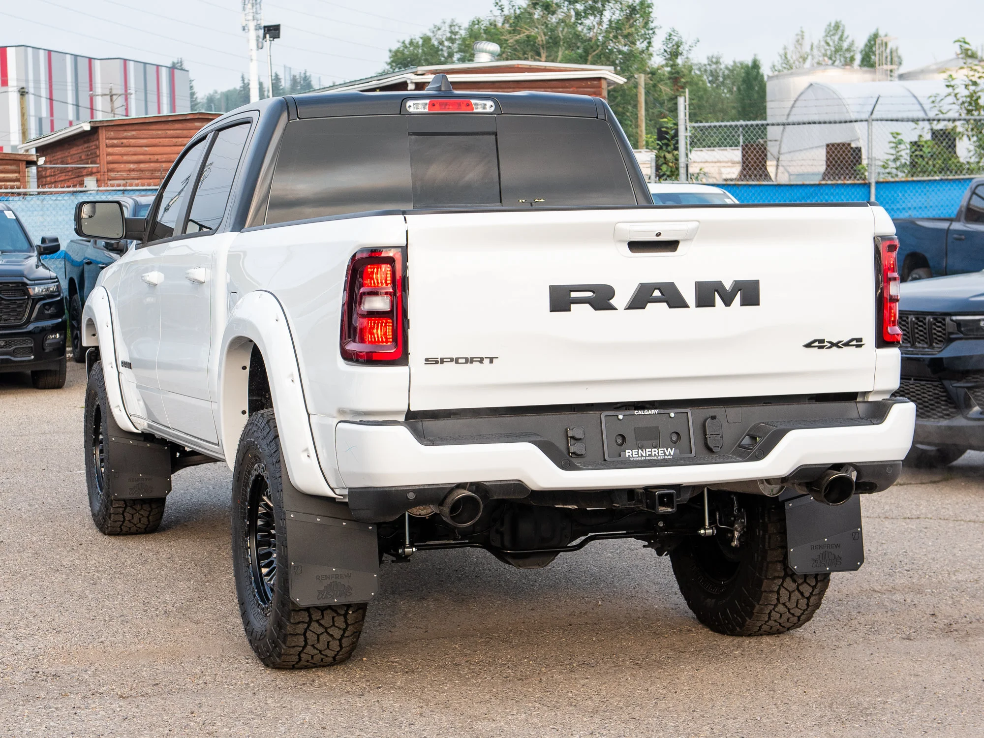 New 2026 White RAM Sport*, 6 Inch Lift, 37 Inch Tires, Trigger Industries Mudflaps image 5