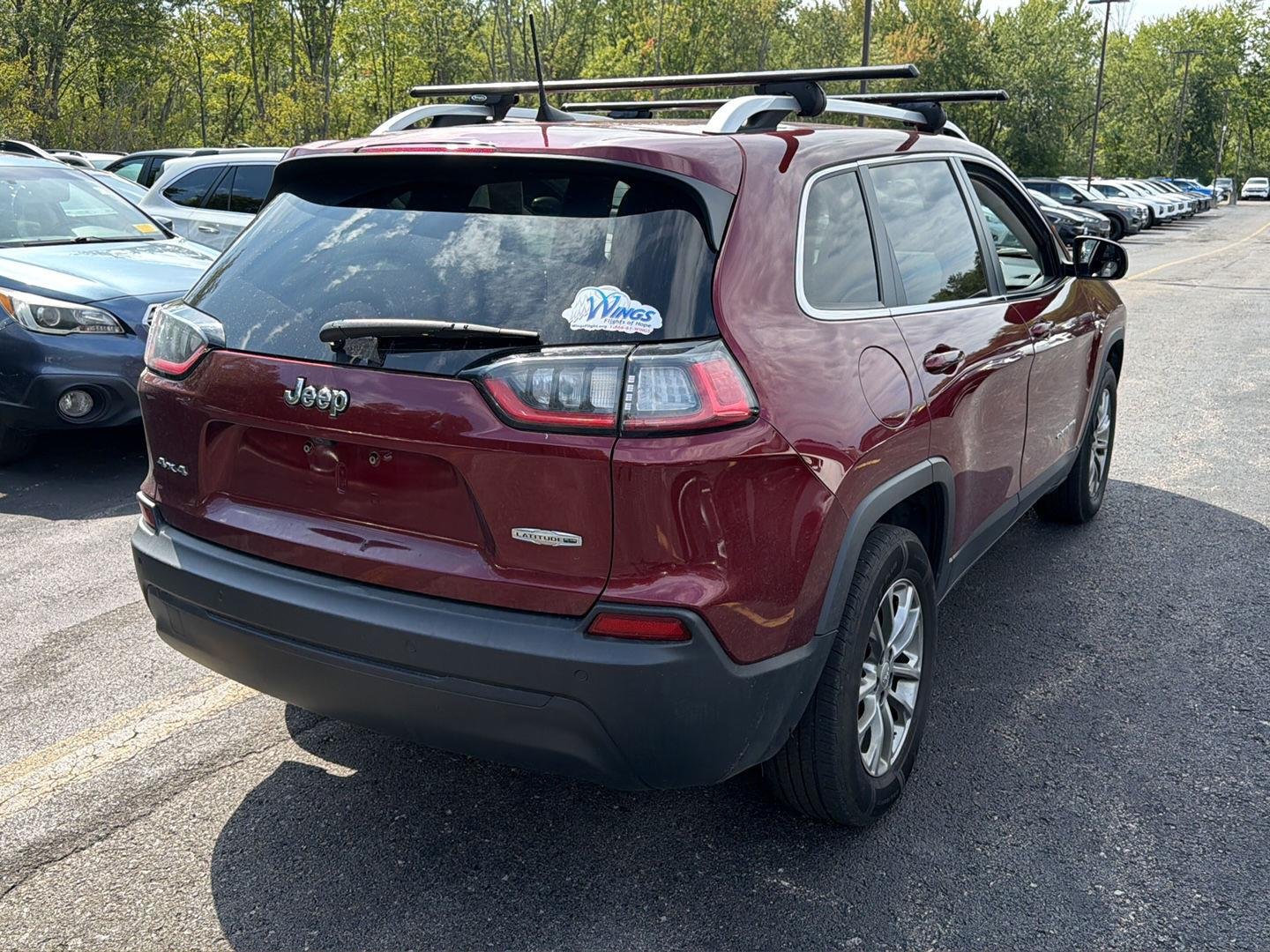 Used 2020 Velvet Red Pearlcoat Jeep Latitude Plus image 7