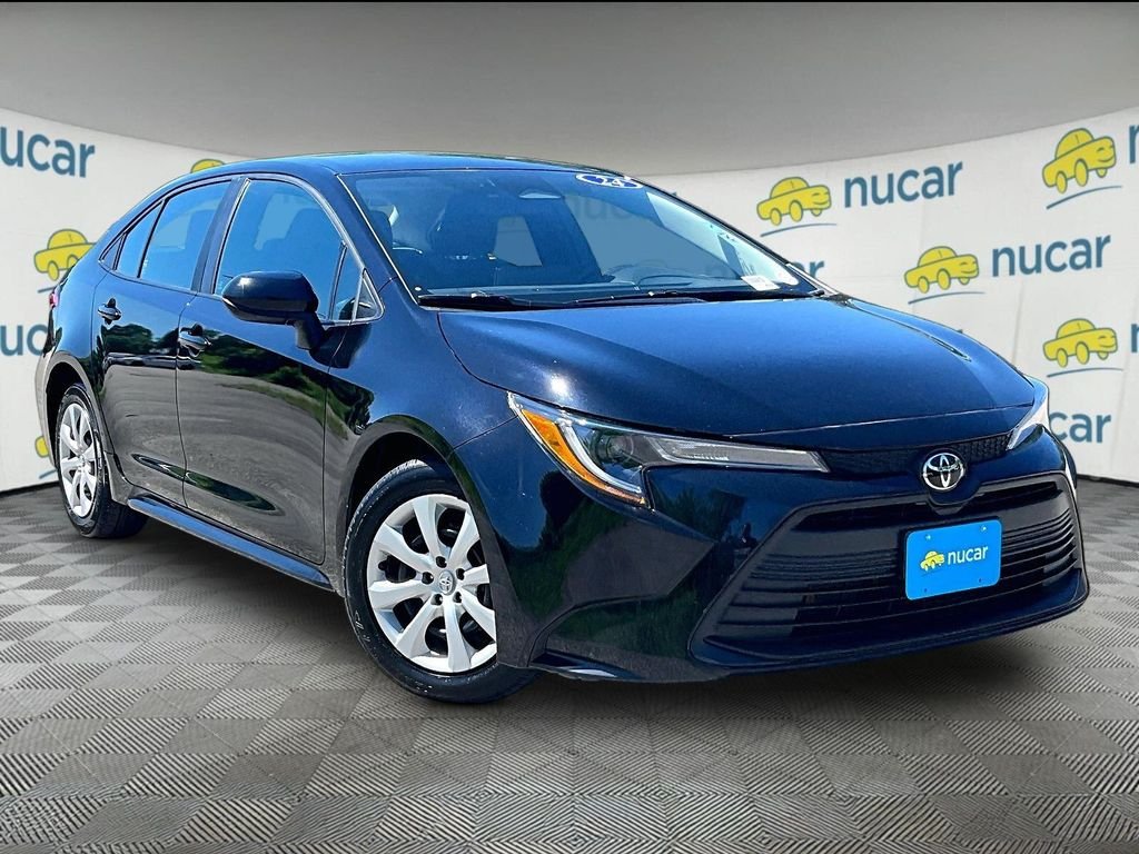Used 2024 Black Toyota LE image 1