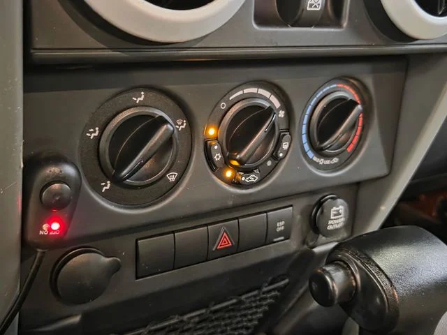 Used 2009 Orange Jeep Unlimited Sahara image 19