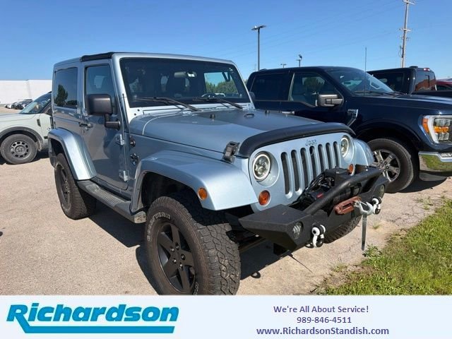 Used 2012 Beige Jeep Sahara image 1