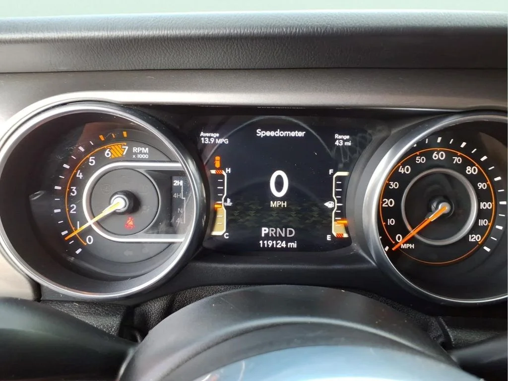 Used 2018 Orange Jeep Unlimited Sahara image 17