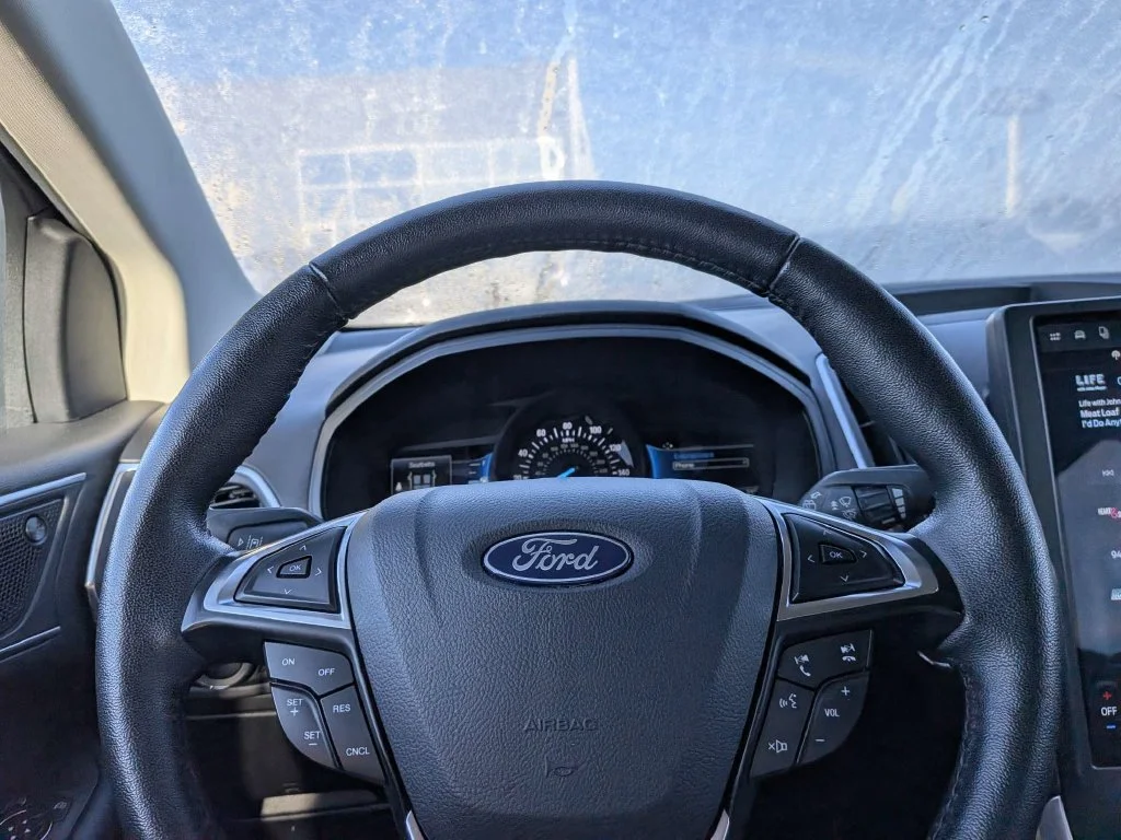 Certified Used 2024 Blue Metallic Ford Titanium image 22