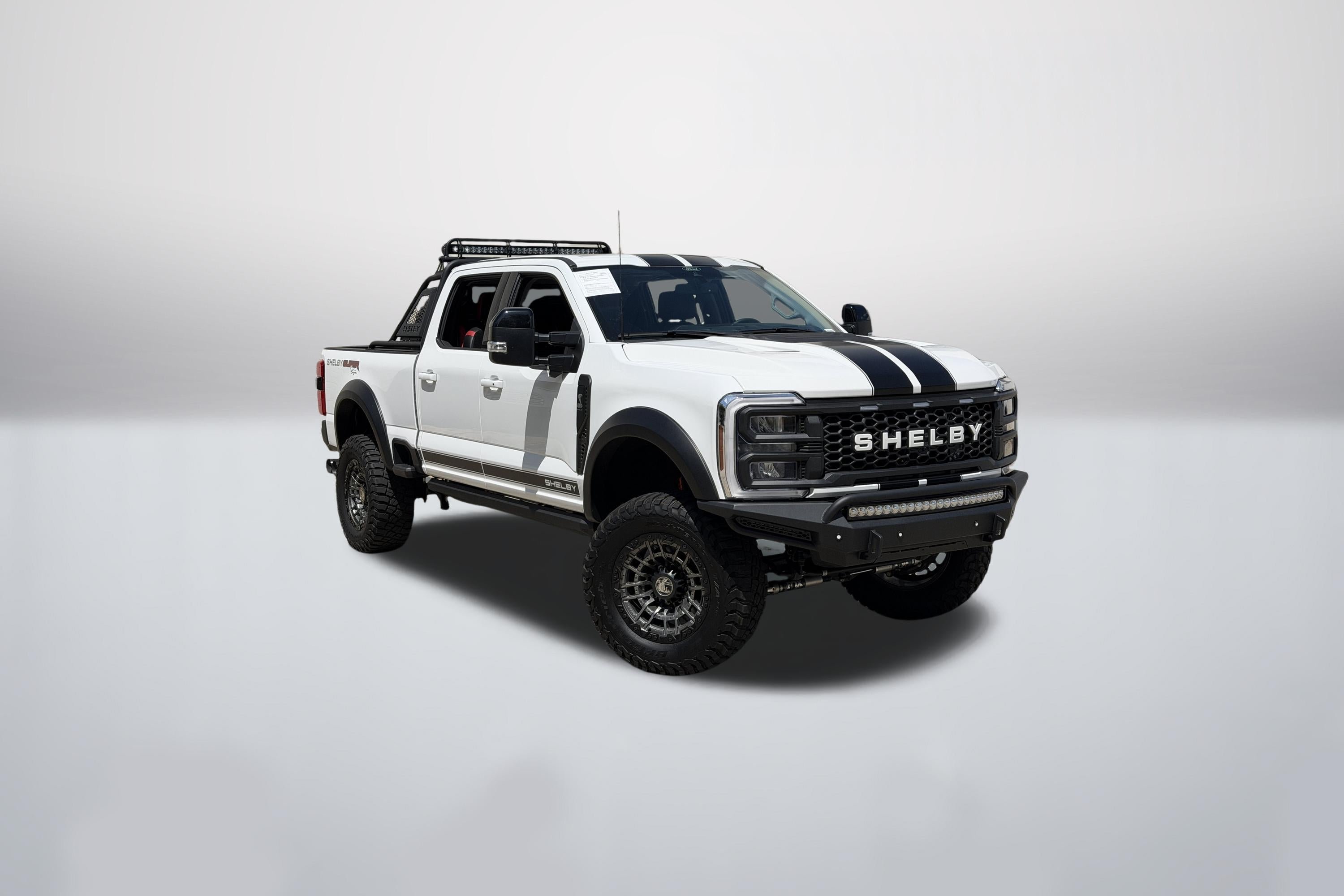 Used 2024 Oxford White Ford SuperCrew 4WD image 1