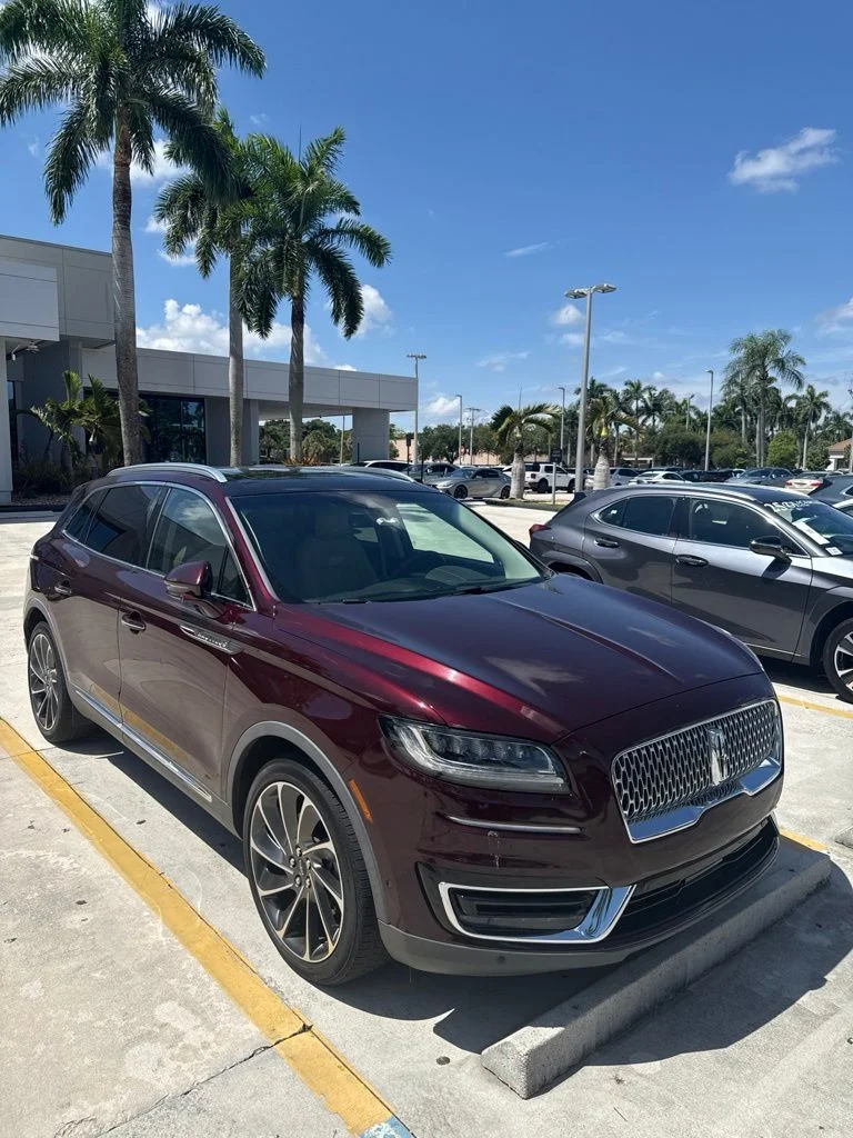 Used 2019 Burgundy Velvet Metallic Tinted Clearcoat Lincoln Reserve image 1