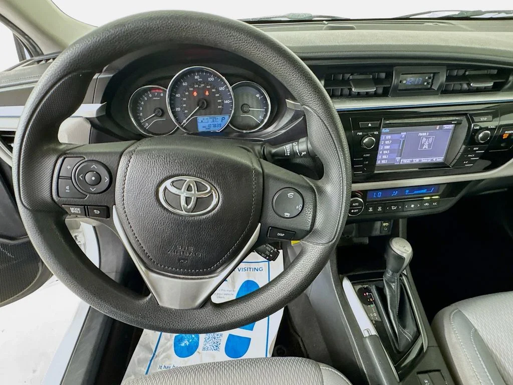 Used 2015 Super White Toyota LE image 12