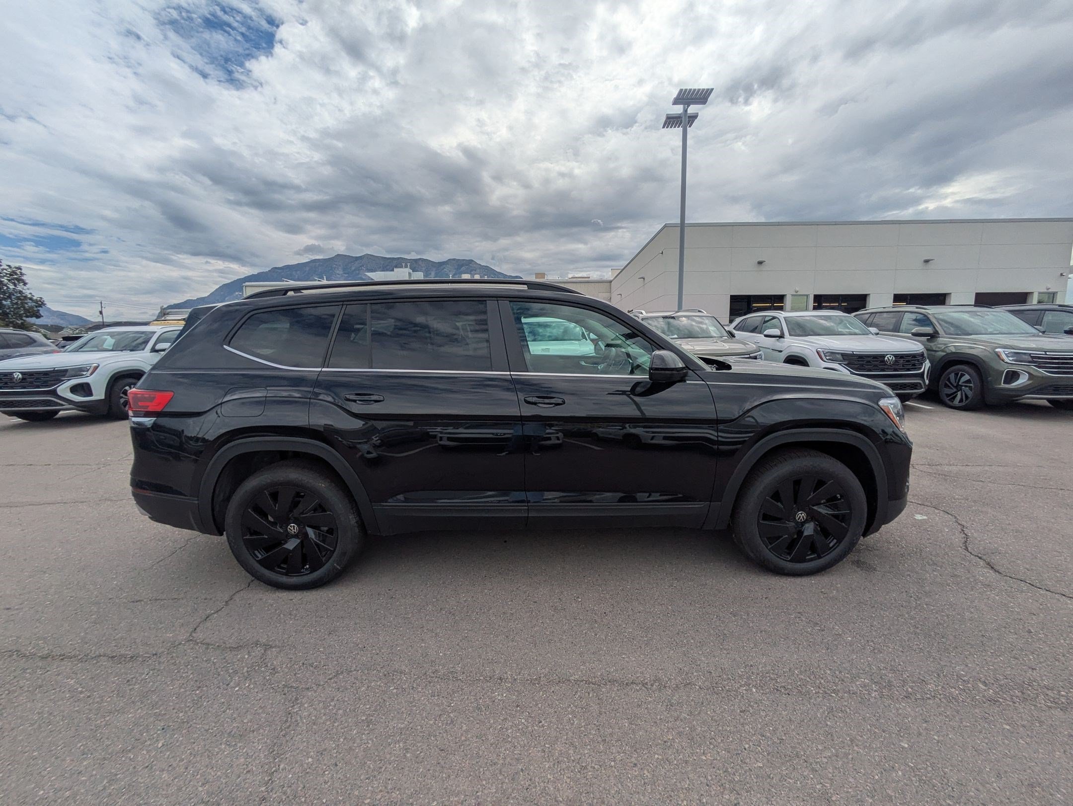 New 2026 Deep Black Pearl Volkswagen 2.0T SE w/Technology image 2