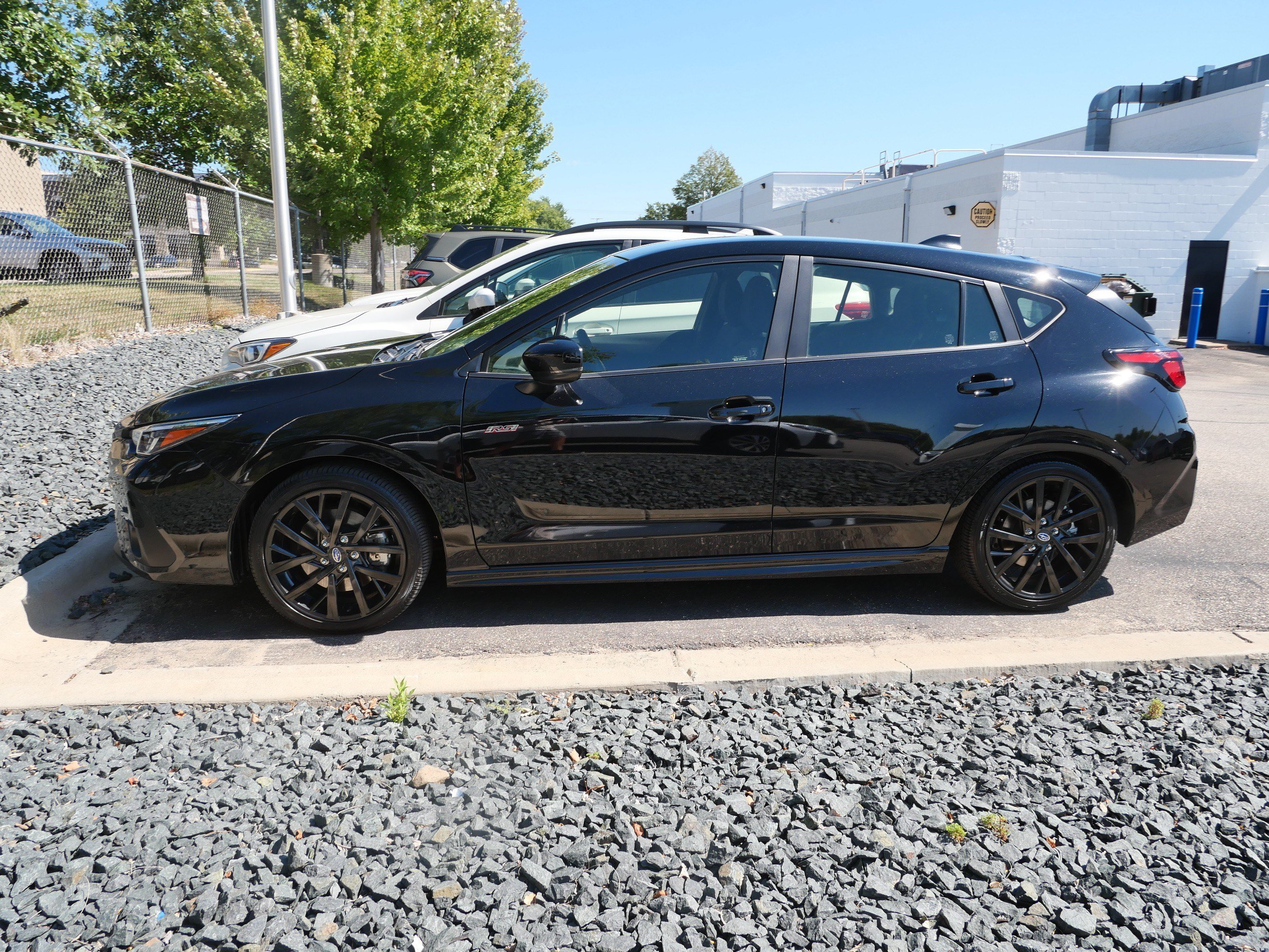 Used 2024 Crystal Black Silica Subaru RS image 5