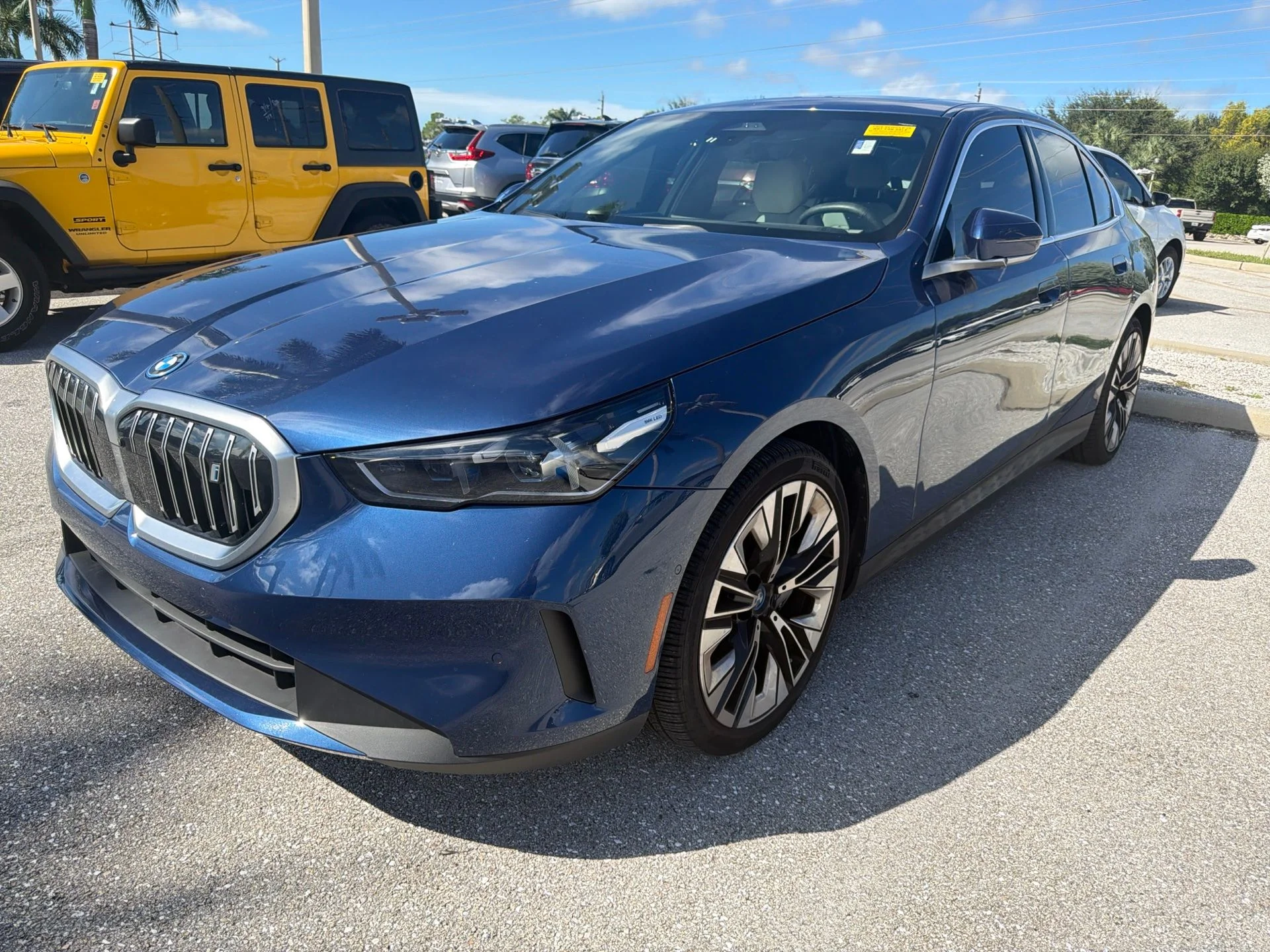 Used 2024 Blue Metallic BMW eDrive40 image 1