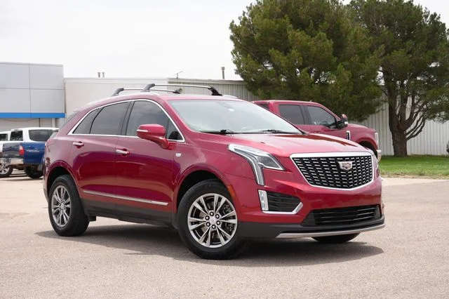 Used 2021 Red Cadillac Premium Luxury image 1