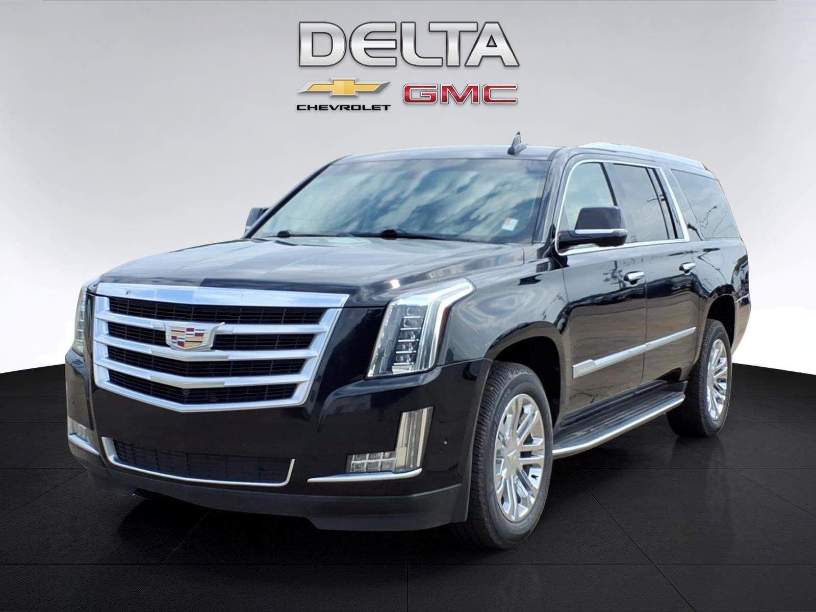 Used 2020 Black Raven Cadillac SUV image 1
