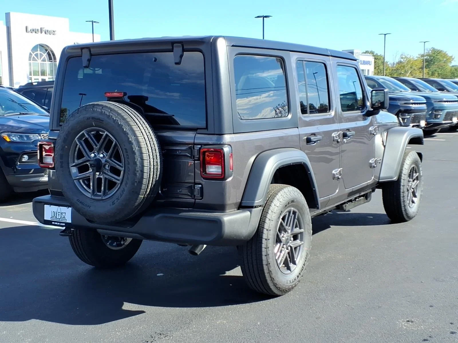 New 2027 Granite Crystal Metallic Clear-Coat Exterior Paint Jeep Sport image 16