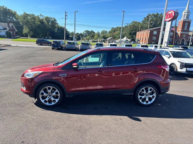 Used 2016 Orange Ford Titanium image 5