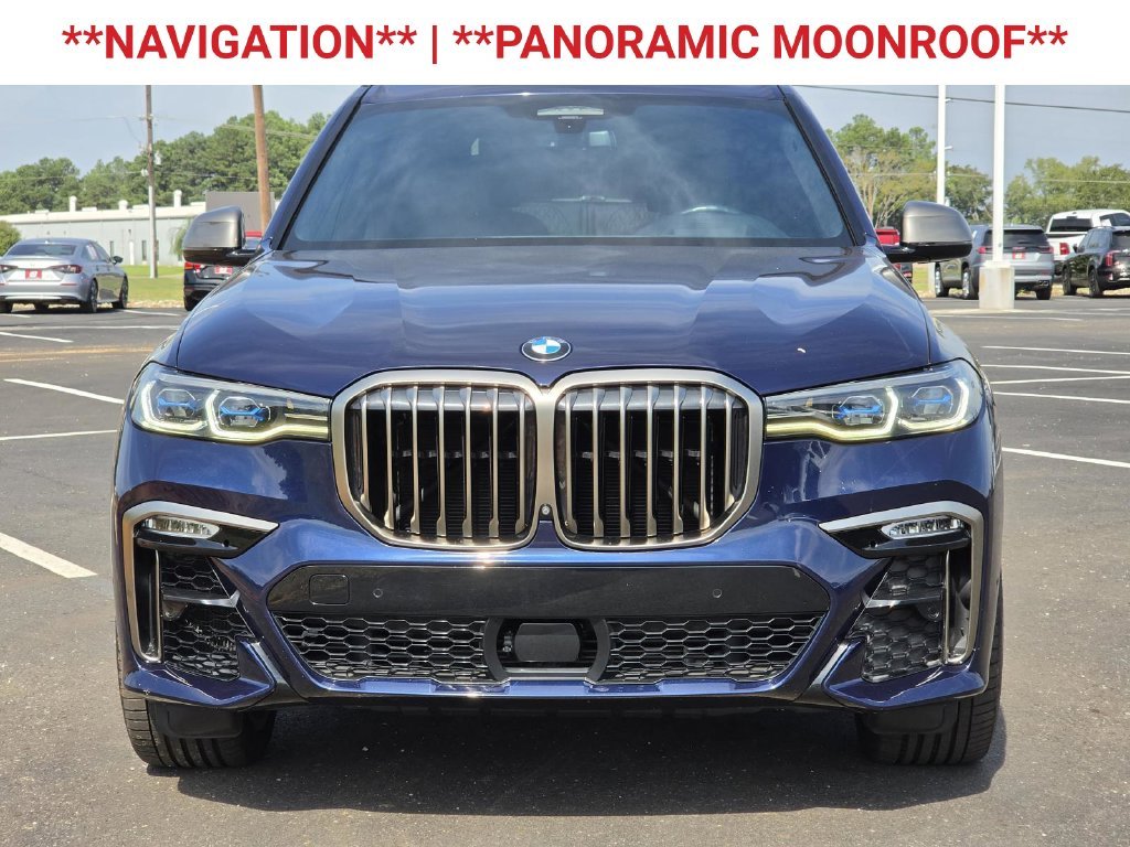 Used 2022 Tanzanite Blue II Metallic BMW M50i image 2