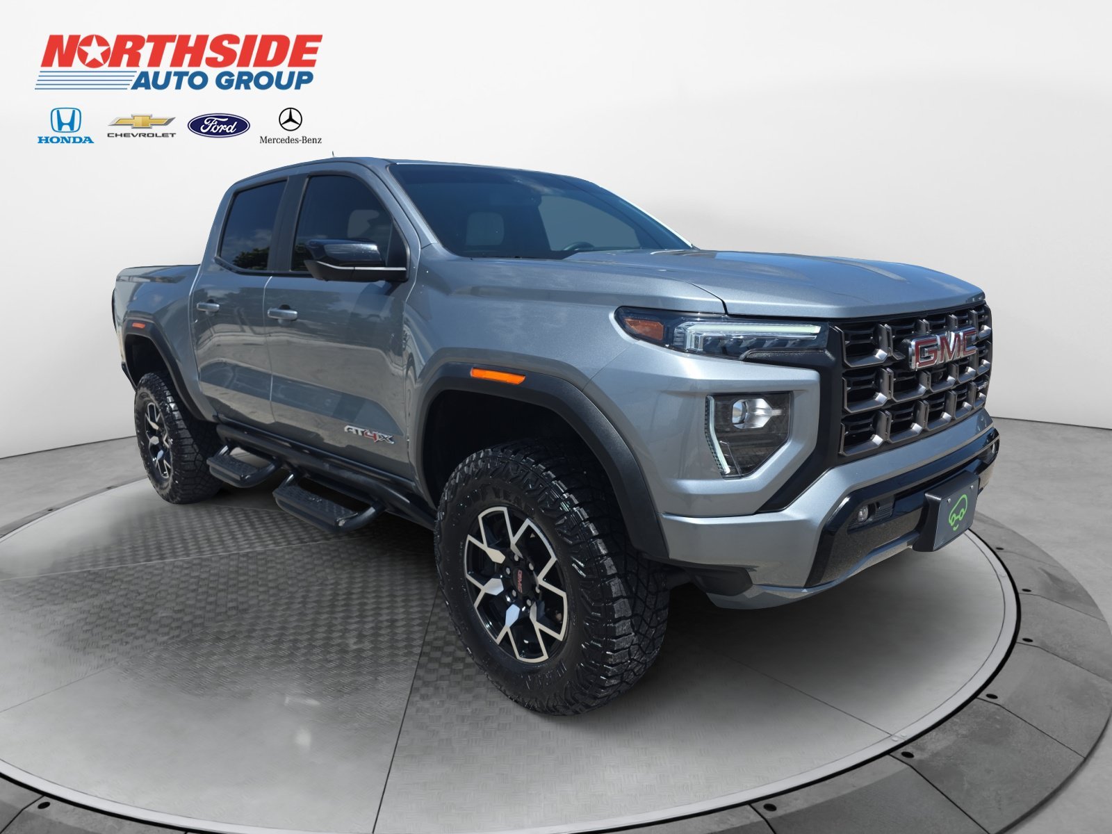 Used 2024 Sterling Metallic GMC 4WD AT4X image 1
