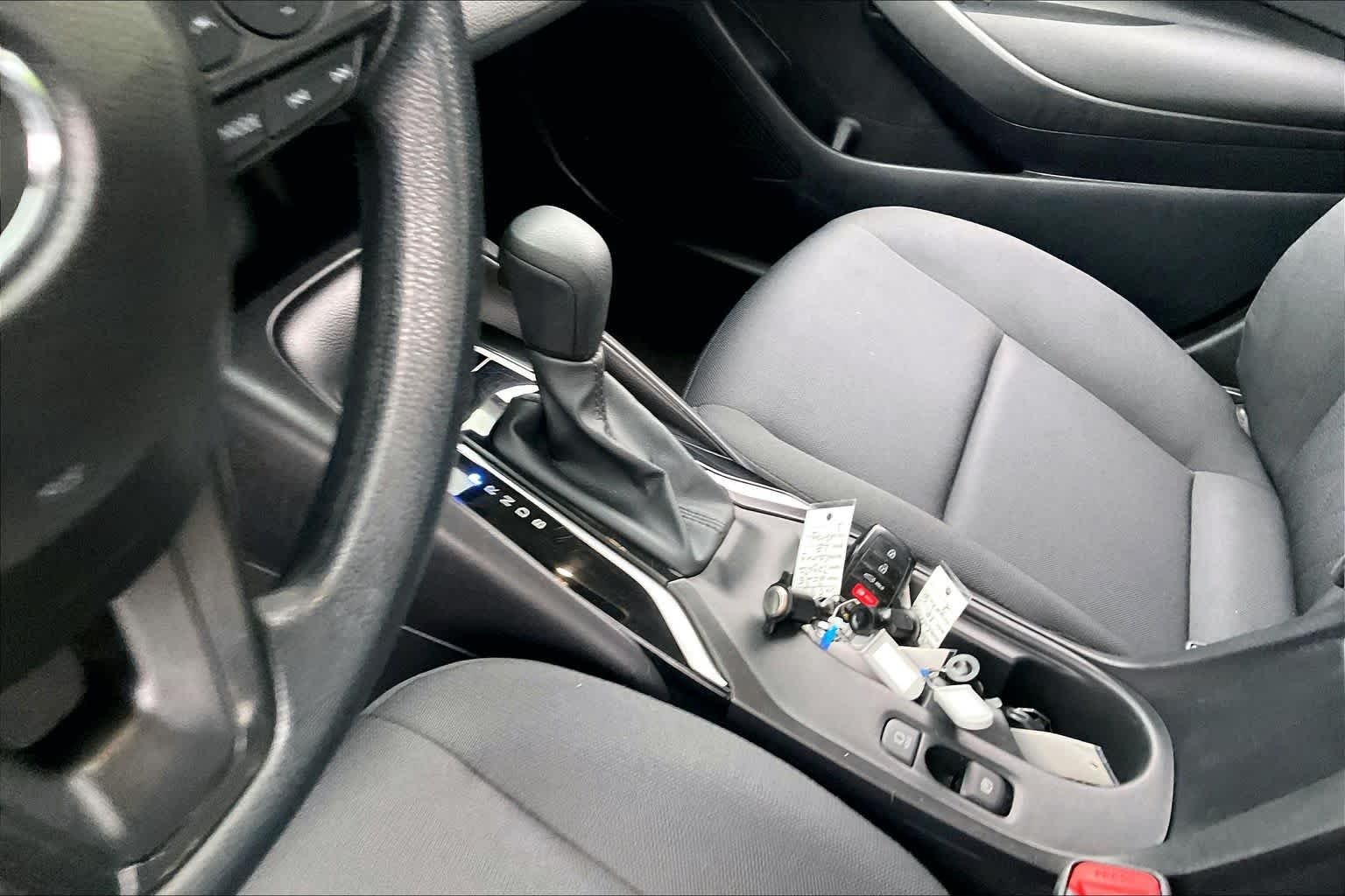 Used 2024 Midnight Black Metallic Toyota LE image 16