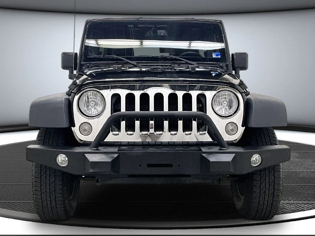 Used 2016 Black Jeep Unlimited Sport image 2