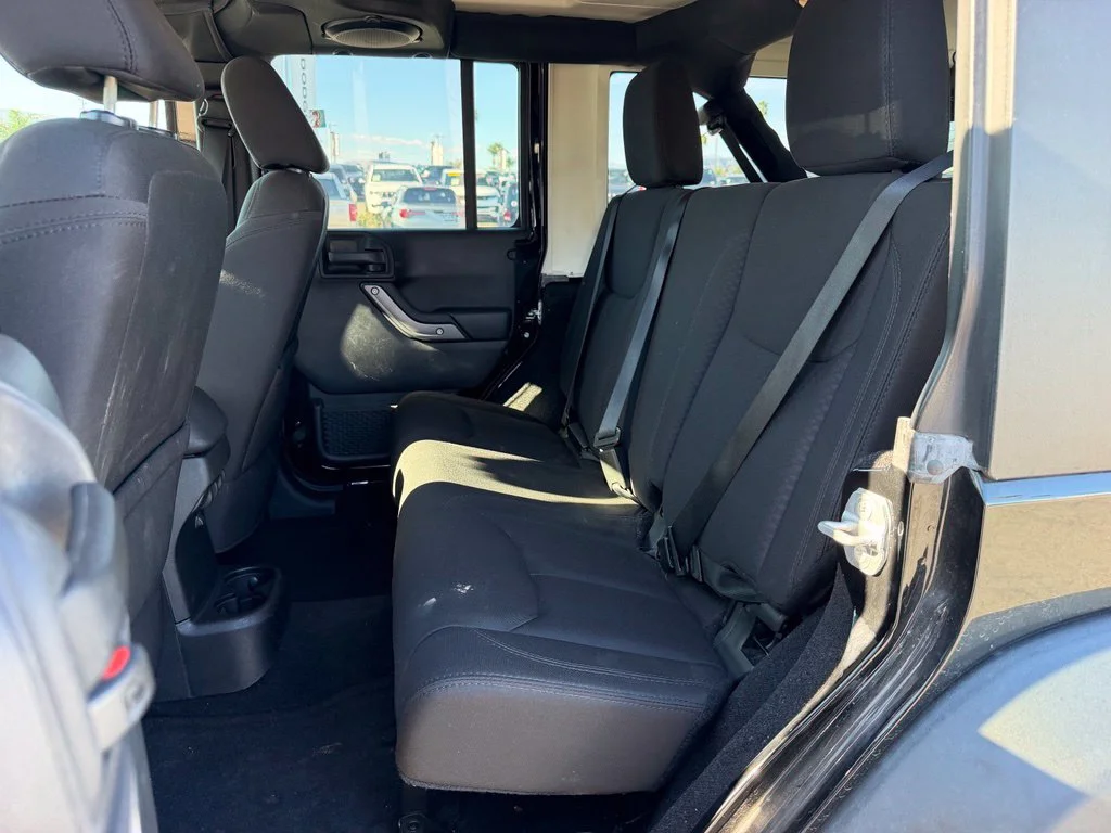 Used 2014 Black Jeep Unlimited Sport image 4