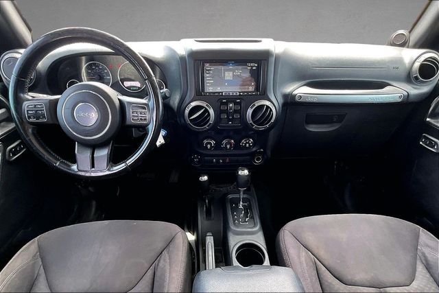 Used 2013 Black Jeep Unlimited Sport image 11