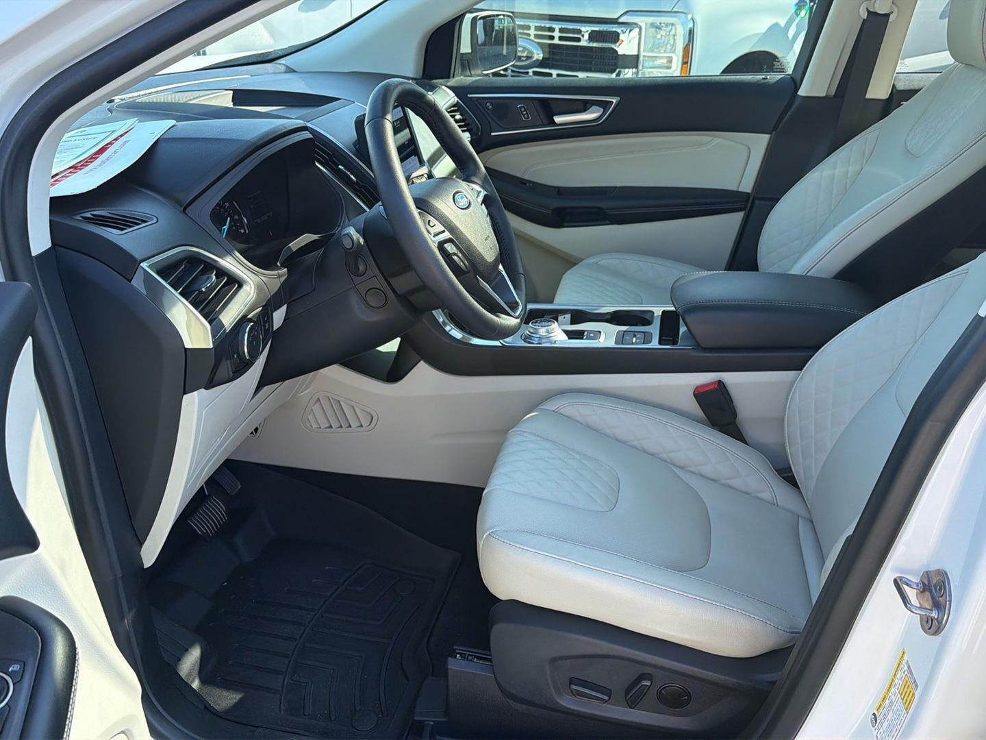 Used 2024 Star White Metallic Tri-Coat Ford Titanium image 10