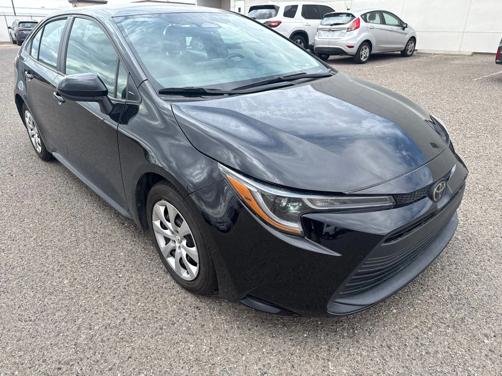 Used 2024 Black Toyota LE image 7