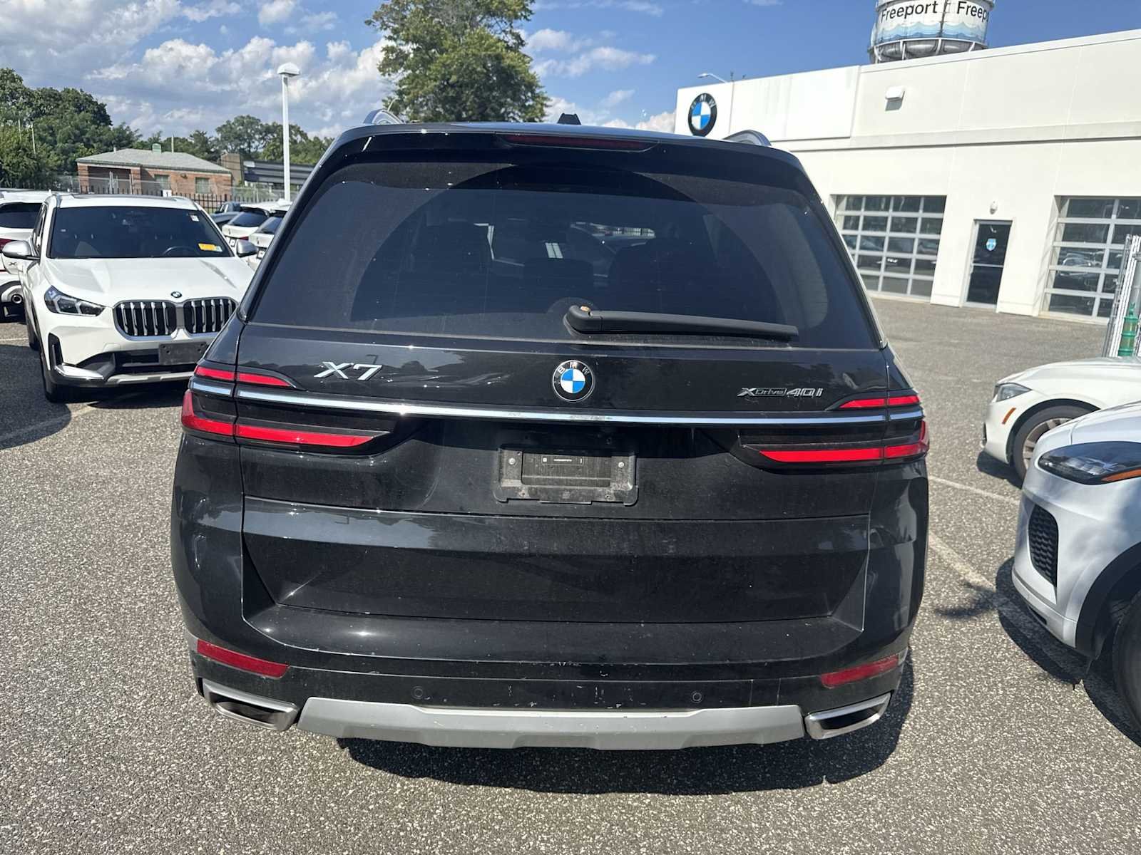 Certified Used 2024 Black Sapphire Metallic BMW xDrive40i image 6