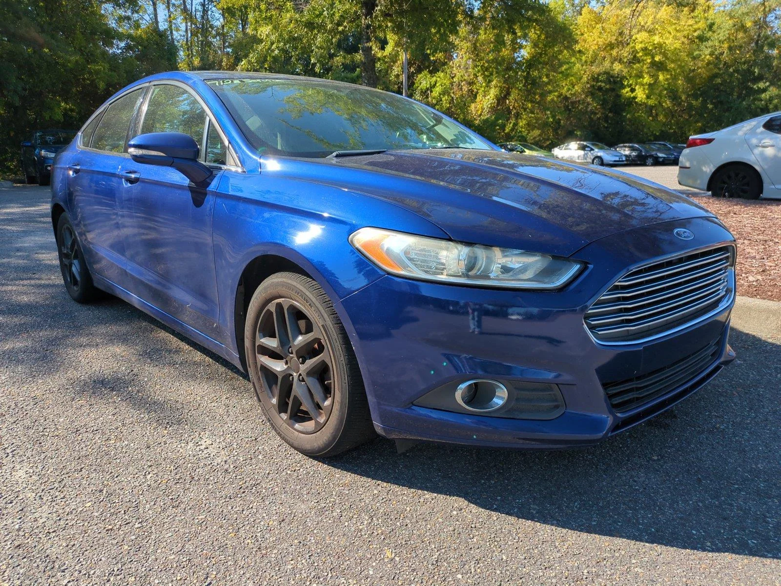 Used 2016 Deep Impact Blue Ford SE image 2