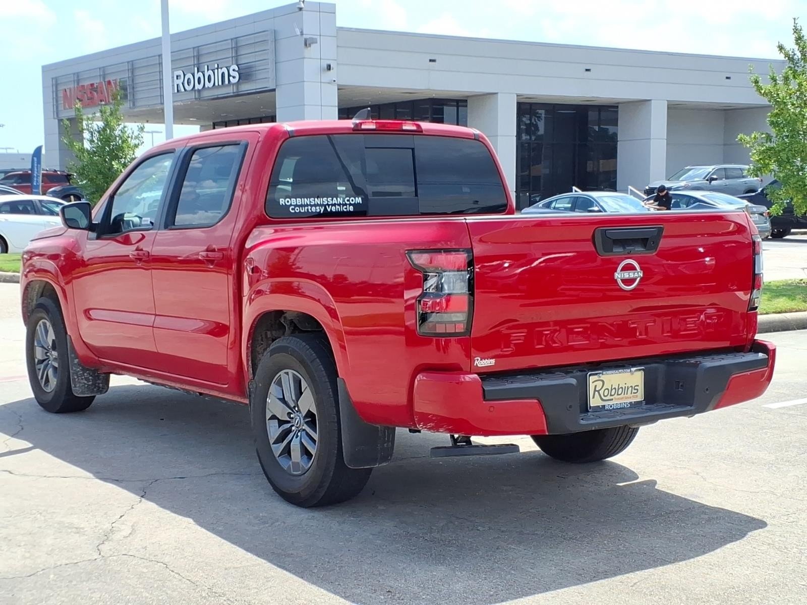 2026 Nissan Frontier SV Red at Robbins Nissan